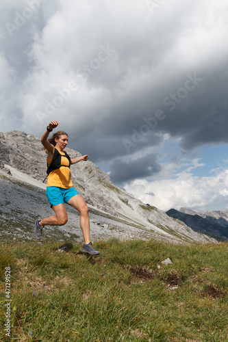 Women trail running in the European alps of Austria