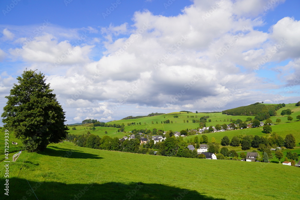 Landscape in the Sauerland near Oberhenneborn. Panoramic view of the green nature with hills and forests.
