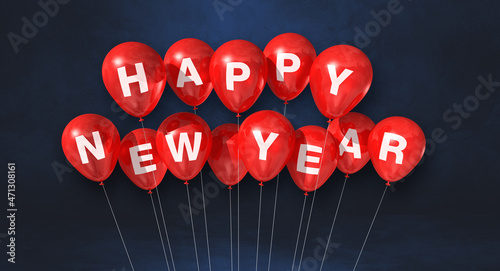 Red happy new year balloons on a black concrete background. Horizontal banner