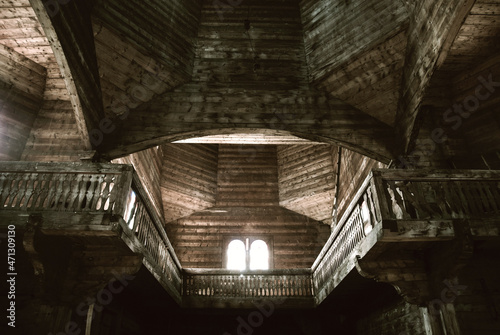 Interior of an old, abandoned wooden church.