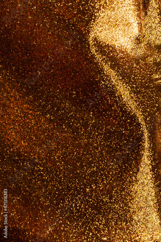 Gold sparkling abstract background.