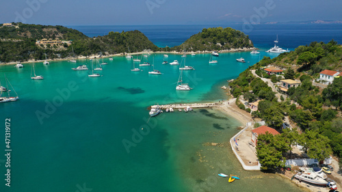 Aerial drone photo of paradise bay and village of Laka visited by yachts and sail boats  island of Paxos  Ionian  Greece