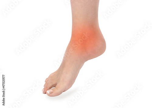 Ankle pain, painful point isolated on white background. Woman with ankle pain holding her aching leg - body pain concept. Joint pain.