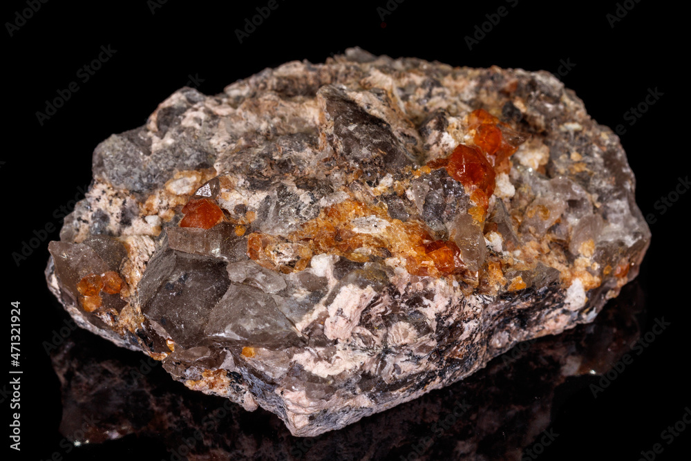macro mineral stone Grossular, Garnet, Epidote on a black background macro mineral stone Grossular, Garnet, Epidote on a black background