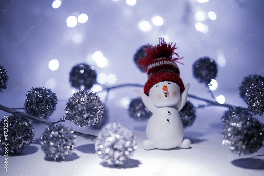 Happy snowman standing in a snowy winter night. Happy snowman standing in a winter Christmas landscape. Merry christmas and happy new year greeting card. Funny snowman in a hat on a snowy background. Happy snowman standing in a snowy winter night. Happy snowman standing in a winter Christmas landscape. Merry christmas and happy new year greeting card. Funny snowman in a hat on a snowy background.