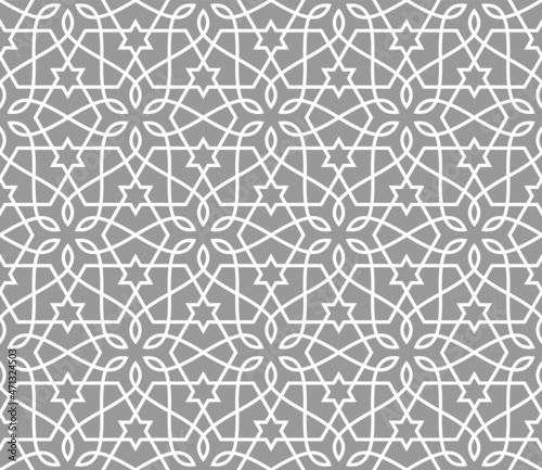 Pattern with intersecting white stripes, stars, stylized leaves on grey background. Abstract seamless vector design for textile, fabric and wallpaper. Stylish monochrome lattice design.