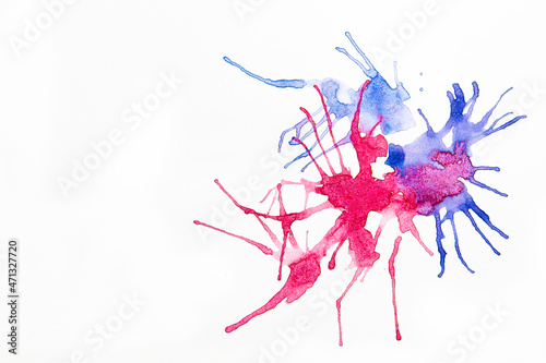 photo of abstract blue and red splash watercolor, drawn by blowing air on wrinkled white paper.Splash watercolor background.