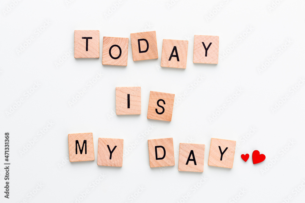 Wooden blocks in a pastel board with the text.