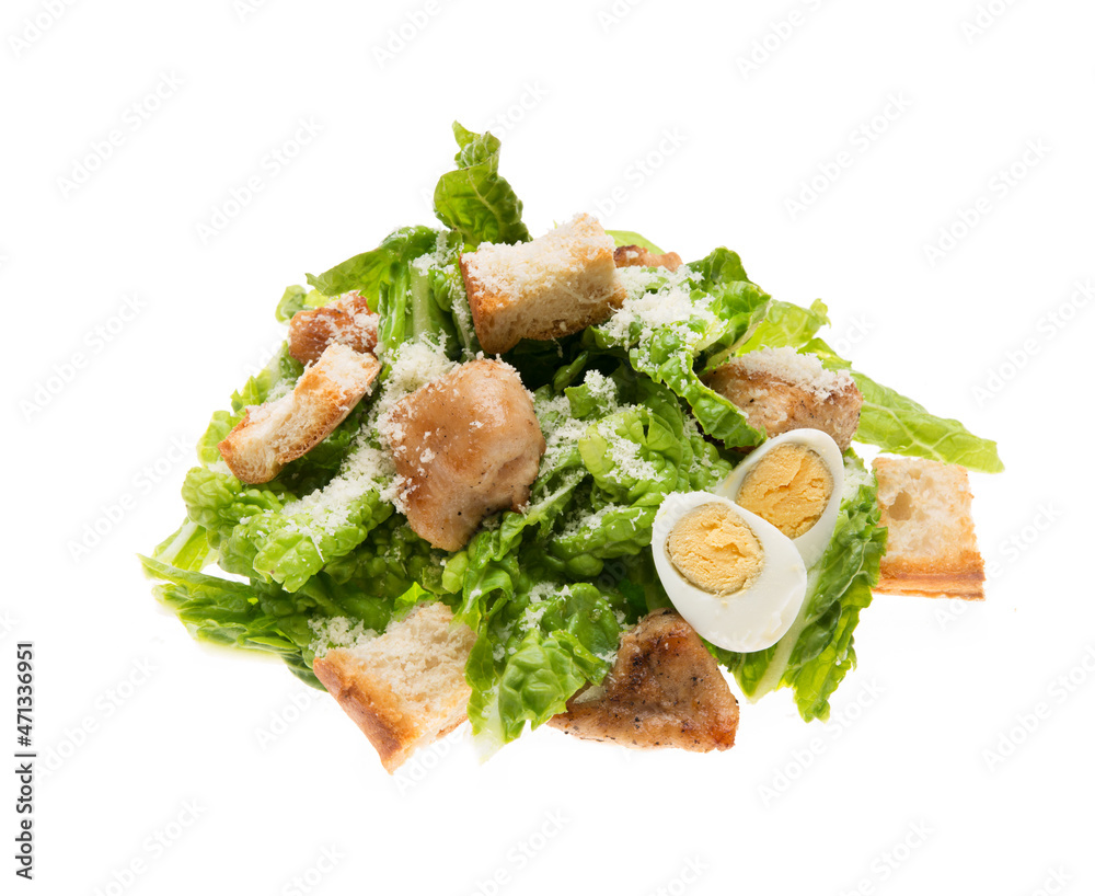 Caesar salad with chicken, croutons and parmesan  isolated on a white background