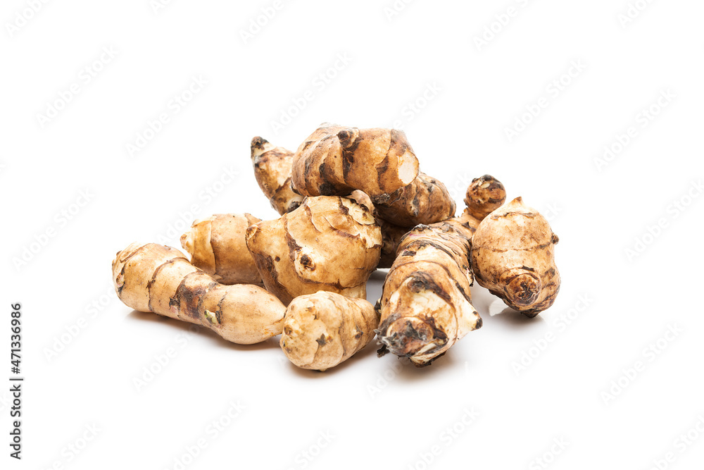 Jerusalem artichoke root isolated on a white background Jerusalem artichoke root isolated on a white background