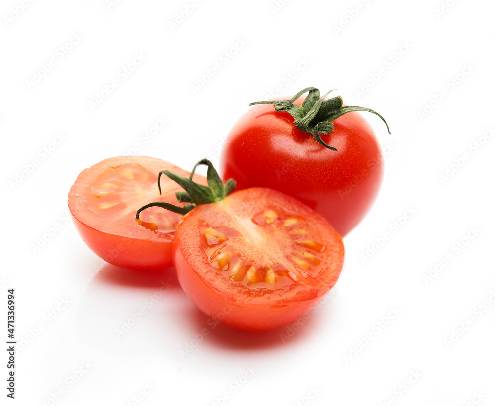 Red cherry tomatoes isolated on a white background Red cherry tomatoes isolated on a white background