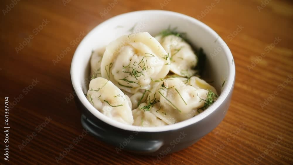 boiled dumplings with meat filling in a bowl boiled dumplings with meat filling in a bowl