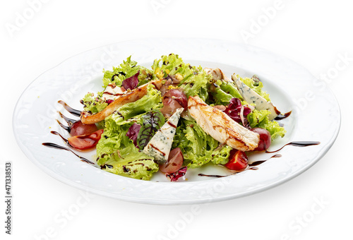 Salad with chicken fillet, dor blue cheese and pistachios. Isolated on a white background.