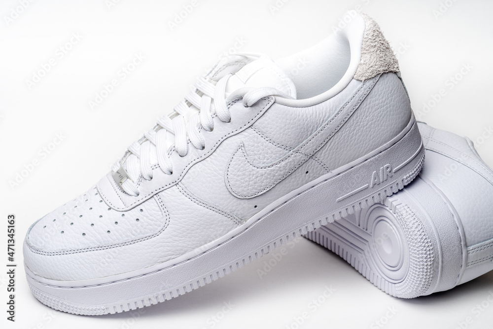 Moscow, Russia - November 2021: Nike Air Force 1 '07 Craft - white low  classic basketball retro sneakers.