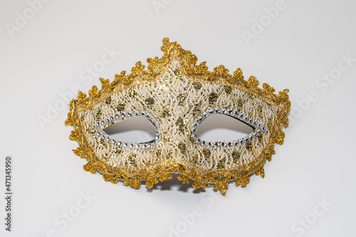 carnival golden mask on a white background