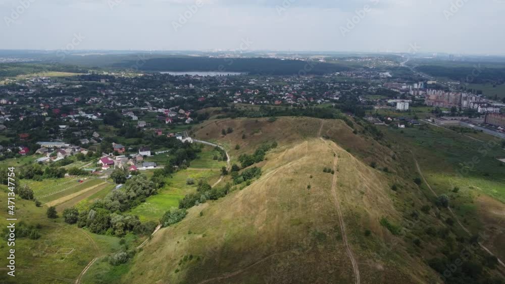 hilly landscape. Beautiful view with hills, clouds and trees. The nature. hilly landscape. Beautiful view with hills, clouds and trees. The nature.