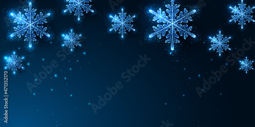 Abstract Christmas digital web banner template with glowing snowflakes on dark blue