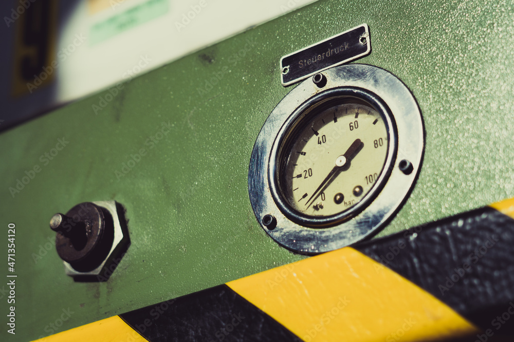 Old industrial gauge meter.