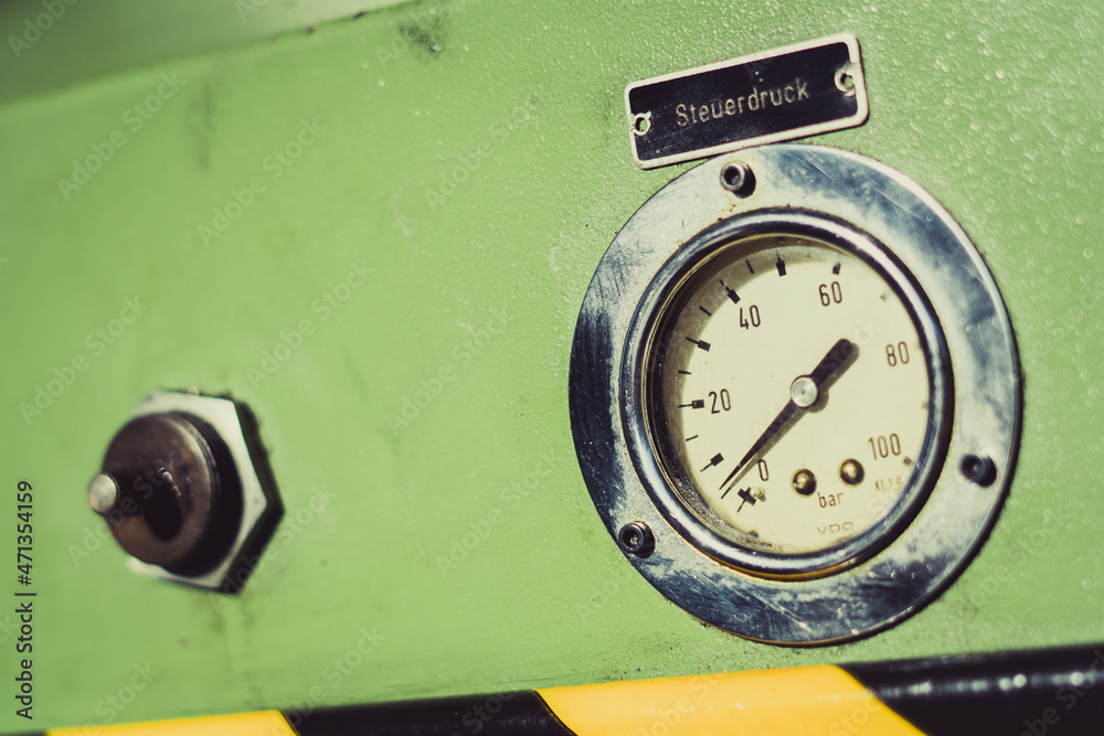 Old industrial gauge meter.