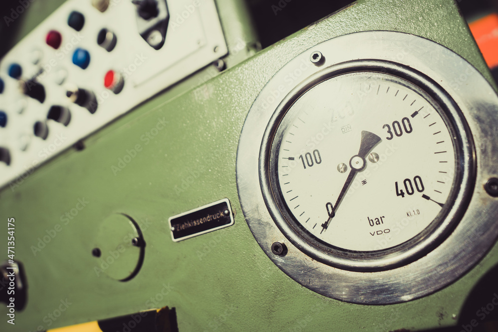 Old industrial gauge meter.
