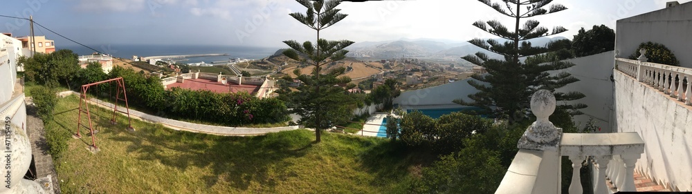 Panoramic view of sea, mountains and trees