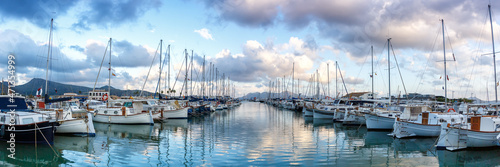 Port de Pollenca marina with sailing boats sailboats on Mallorca travel traveling holidays vacation panorama in Spain photo