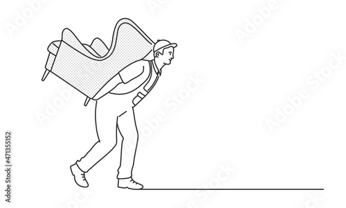 Mover carries a chair on his back. Moving company services.