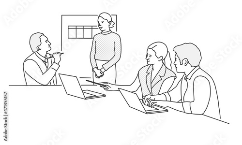 Group of office workers sitting at desks and communicating or talking to each other.