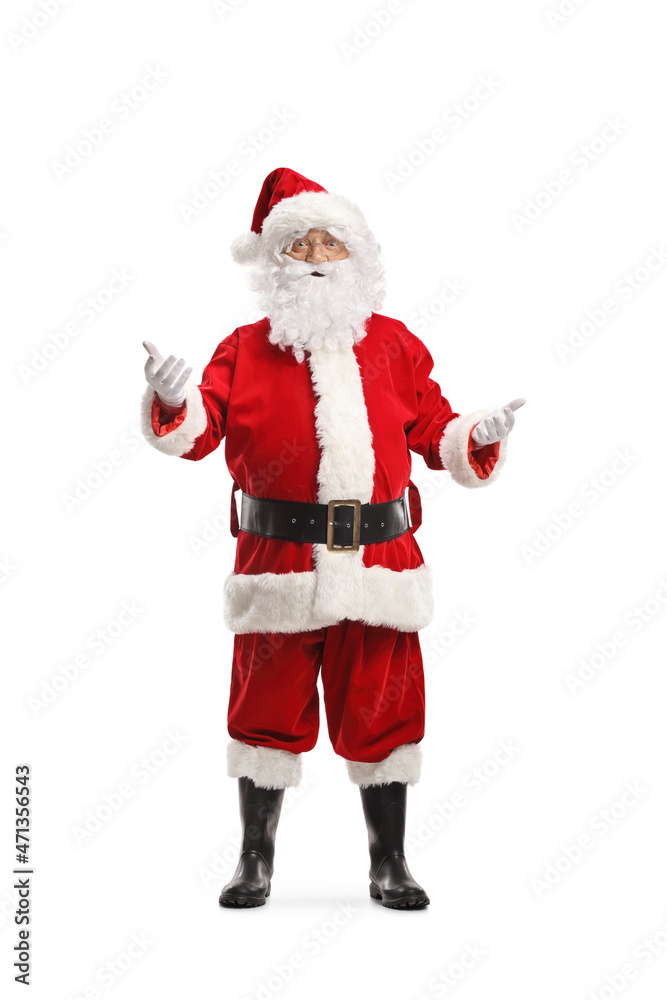 Full length portrait of Santa Claus standing and gesturing with hands Full length portrait of Santa Claus standing and gesturing with hands