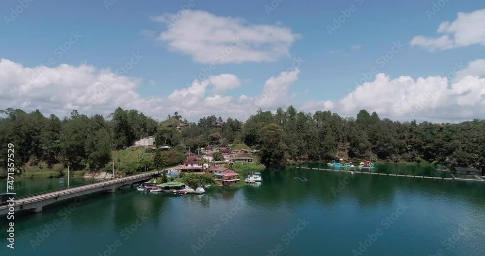 Bridge over Water Reserve which is the Main Road to get to the Village of Guatape in Antioquia, Colombia Bridge over Water Reserve which is the Main Road to get to the Village of Guatape in Antioquia, Colombia
