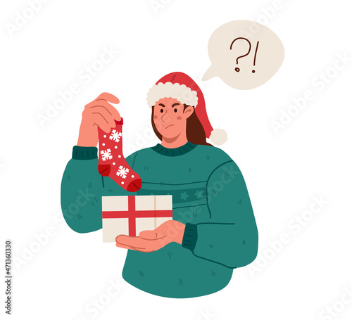 Bad christmas present,disappointed woman with bad gift in hand.Flat illustration