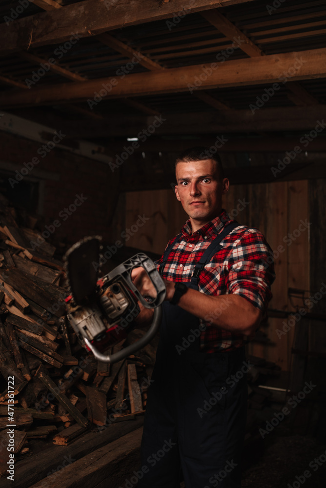
farmer in a plaid shirt with a chainsaw