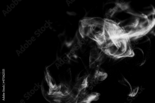 White steam smoke on solid black background with abstract blur motion wave swirl use as an overlay effect for vapor cigarette dry ice hot water and food soup © Chan2545