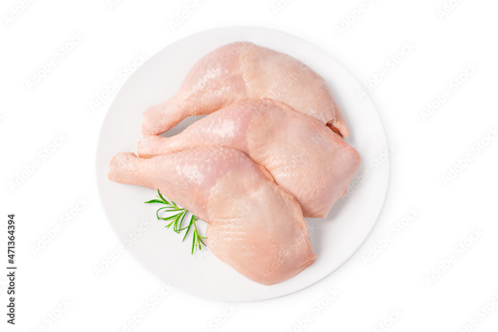 Fresh chicken legs.Three raw whole chicken legs on a white plate on a white isolated background.