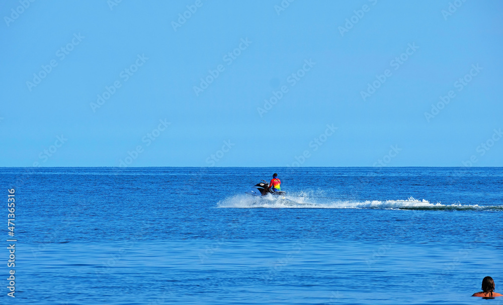 A man driving a jet ski boat 2