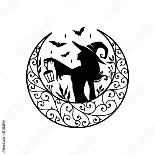 Silhouette of beautiful young witch with crescent moon decoration