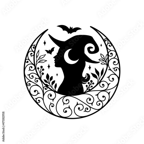 Silhouette of beautiful young witch with crescent moon decoration