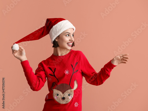 Young woman in stylish Chri...