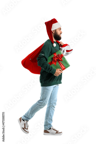 Walking man with Santa bag ...
