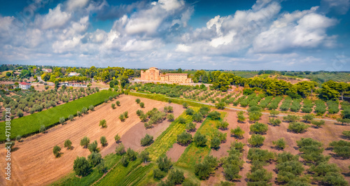Impressive summer view from flying drone of Abbey of San Giovanni in Venere. Picturesque morning scene of olive garden in Italy, Europe. Traveling concept background.