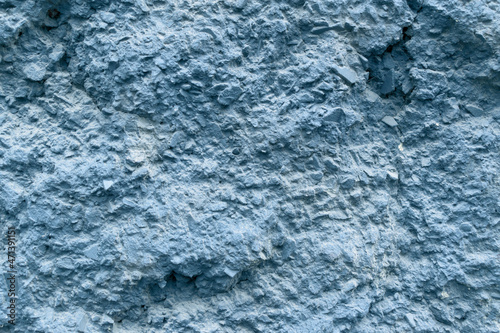 Textured stone surface for backdrop. Color Chambray, Hue Blue.