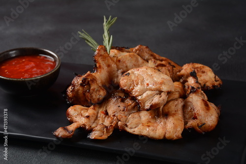 Grilled Marinated boneless skinless chicken thighs((Pargiot). Traditional Israeli dish photo