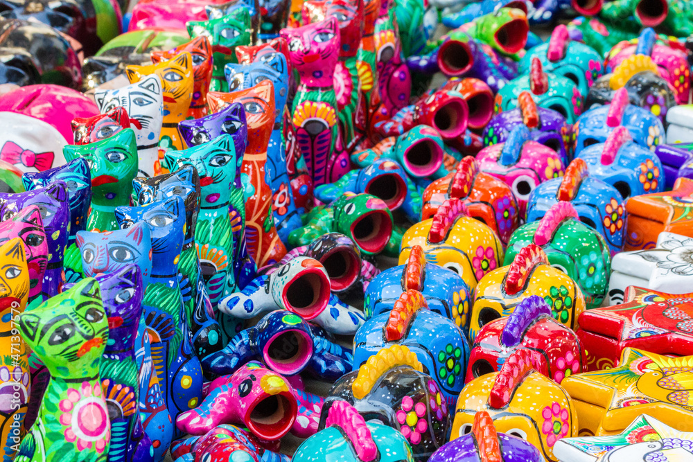 Closeup to small typical sculptures from Mexico. This items are sold as souvenirs almost anywhere in this country. Closeup to small typical sculptures from Mexico. This items are sold as souvenirs almost anywhere in this country.