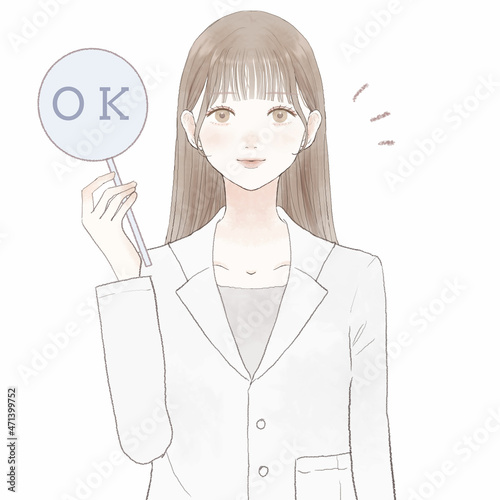 OKサインを出す女性医師