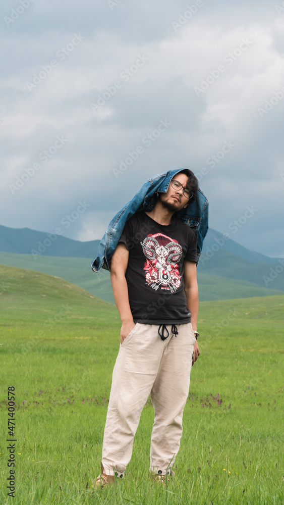 The man traveling in Western Sichuan, China The man traveling in Western Sichuan, China