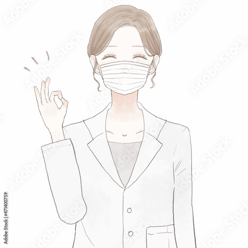 OKサインを出す、不織布マスクを着用している女性医師