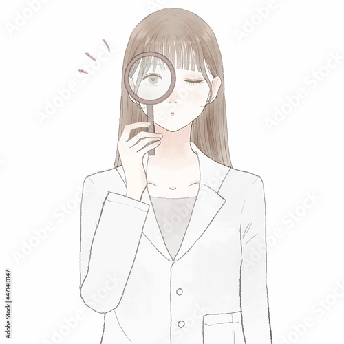 ルーペを使ってチェックしている女性医師