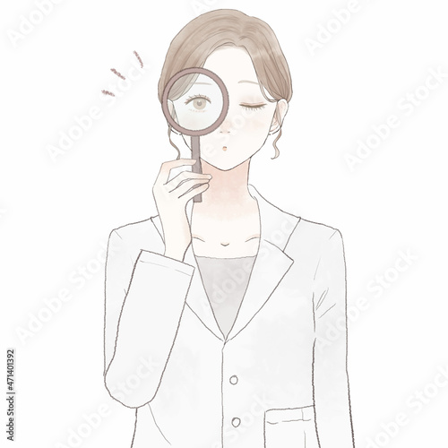 ルーペを使ってチェックしている女性医師