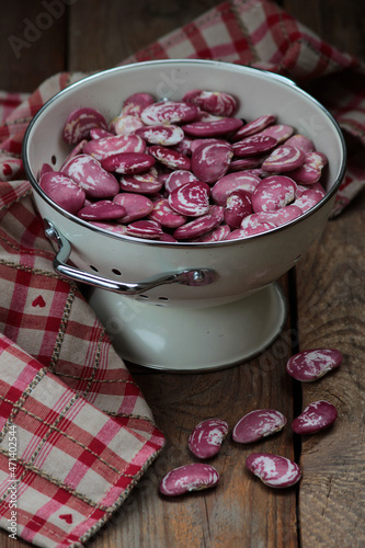 Red fava beans in a colander