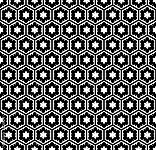 Seamless hexagons and flowers pattern. Abstract floral texture.